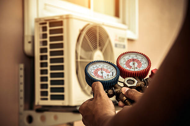 Professional Hvac technician working in Hingham, MA